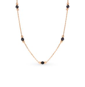 золотое шейное украшение с ониксом